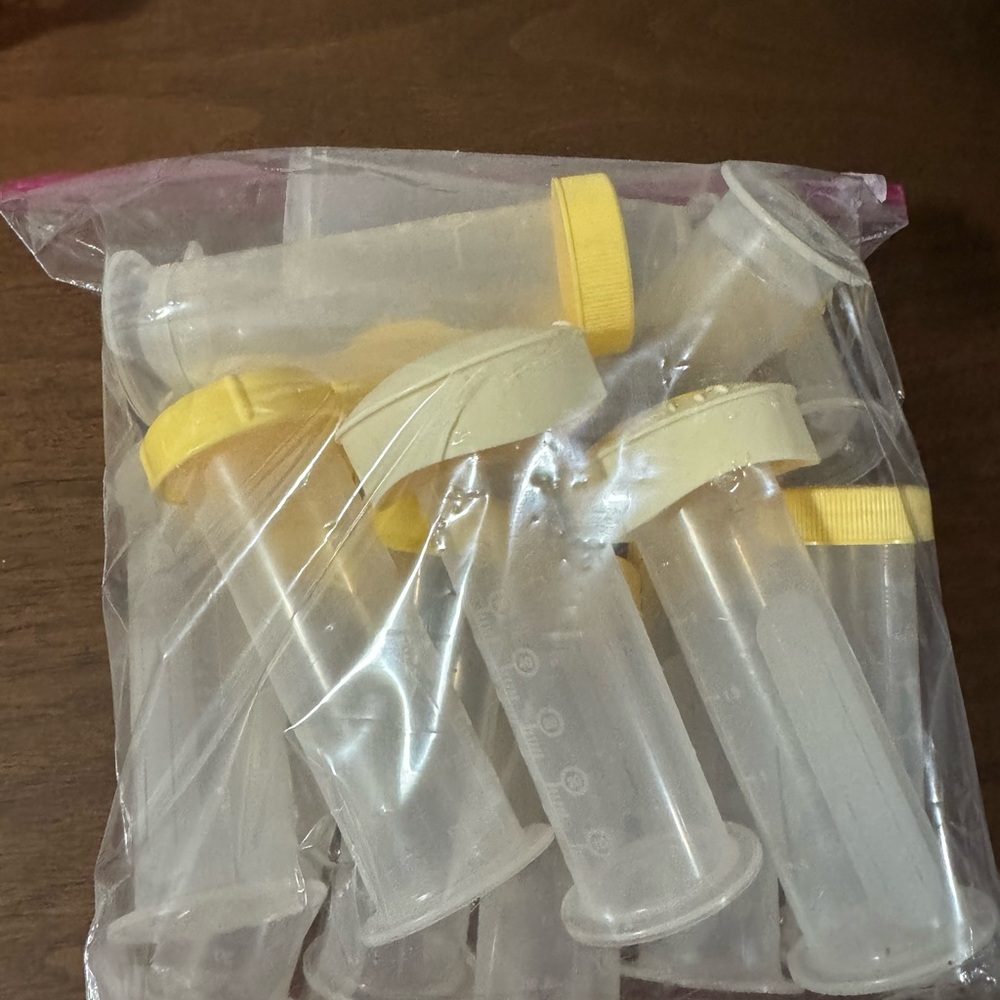 Medela Yellow and Clear Storage Bottles Set of 15 (Lot # 2)